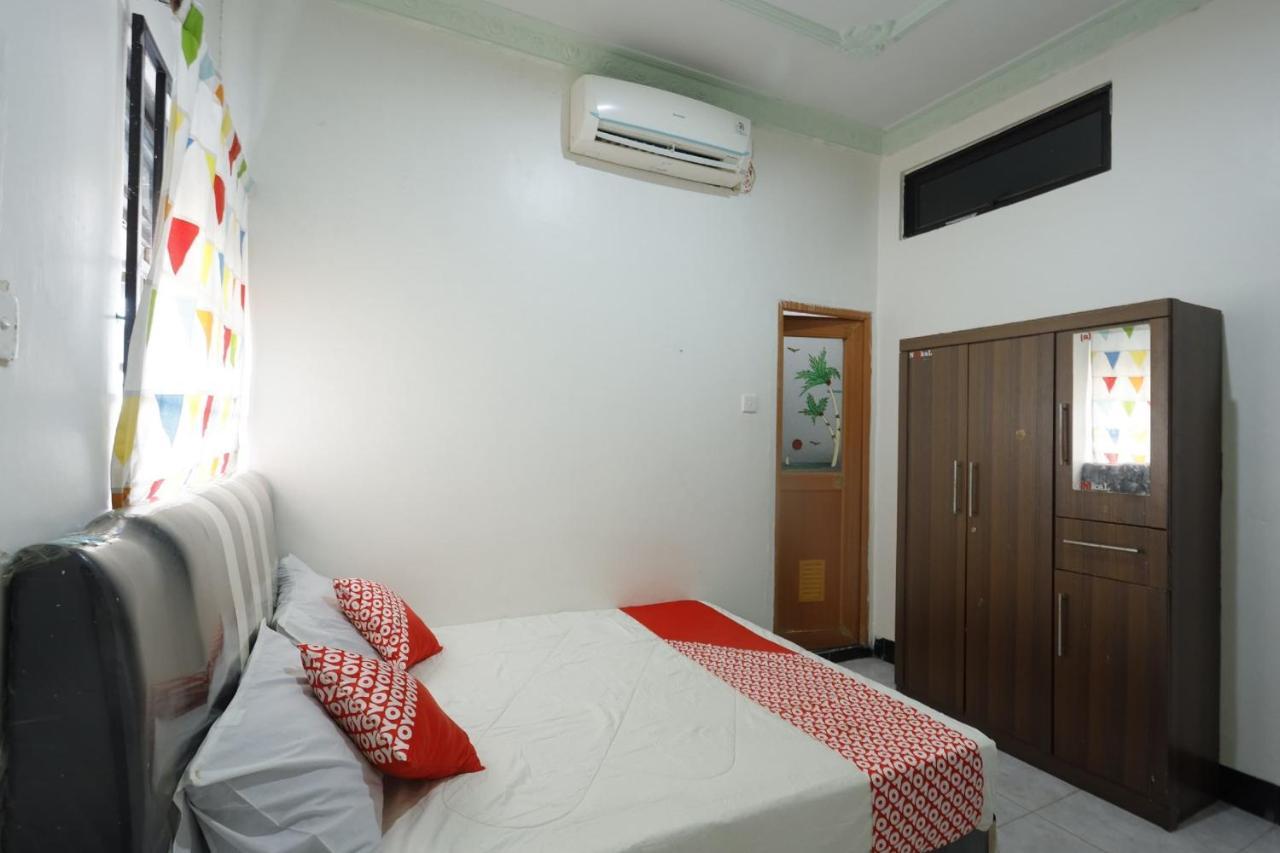 Отель Oyo 92702 Minang Jaya Нагоя Экстерьер фото